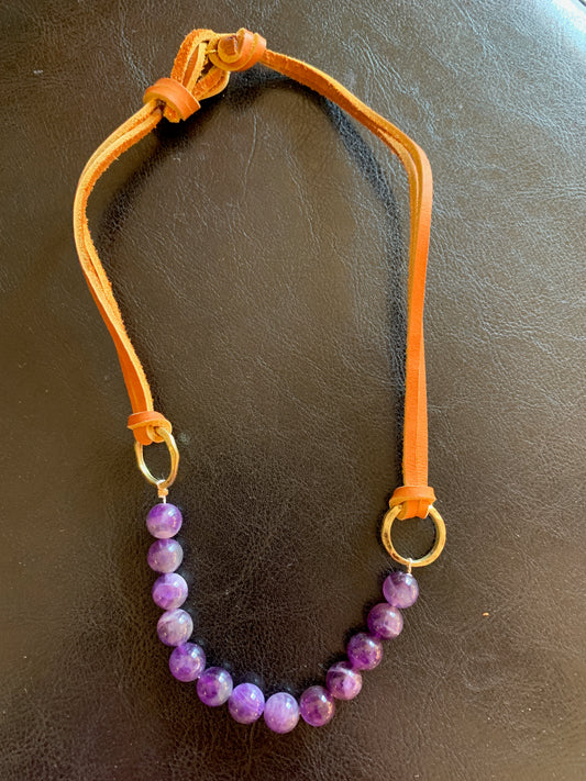 Amethyst on deer hide
